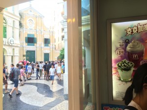 Here you can see the oldest church in Macau and a McDonald's sundae advertisement in the same view. 