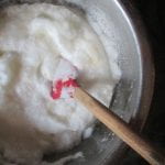 Mixing bowl full of fluffy white cake mix