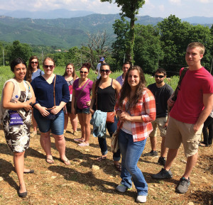 Visiting a mountain tea field near Komotini in northeastern Greece, where the Tunuvu “of the Mountain” Tea company educates local growers on how to grow and market their products. (Front, left to right): Yasmin Vasquez, Amalia Kontoulis, Collin McCorkel; (back) Leah Krisch, Kaitlin Steinbugl, Casey Branstetter, Megan Shugarts, Jordan Teagarden, Graham Rhone, and Will Wenckus