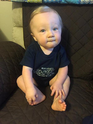 Mitchell McFarland, son of Keri McFarland ’04, sports his new Penn State Altoona onesie.