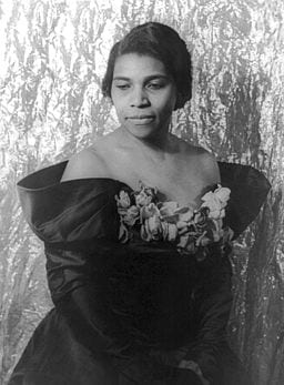Portrait of Marian Anderson in an off-the-shoulder evening gown.