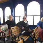 photo of Penn State Educational Office Professionals inside the Big Blue Bus on the recycling tour