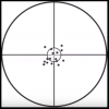 Photo of a field test, consisting of a balck and white targets with multiple dots indicating focus on the center, for the Ocula Track