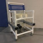 Photo of chair made of white PVC pipe with metal jack system component attached