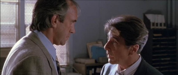 Ricky Roma (Al Pacino) discusses a land deal with James Lingk (Jonathan Pryce)