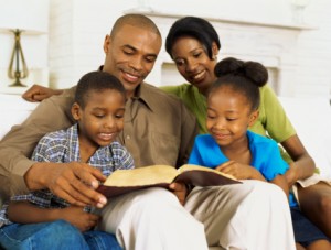 parents and their children reading the bible
